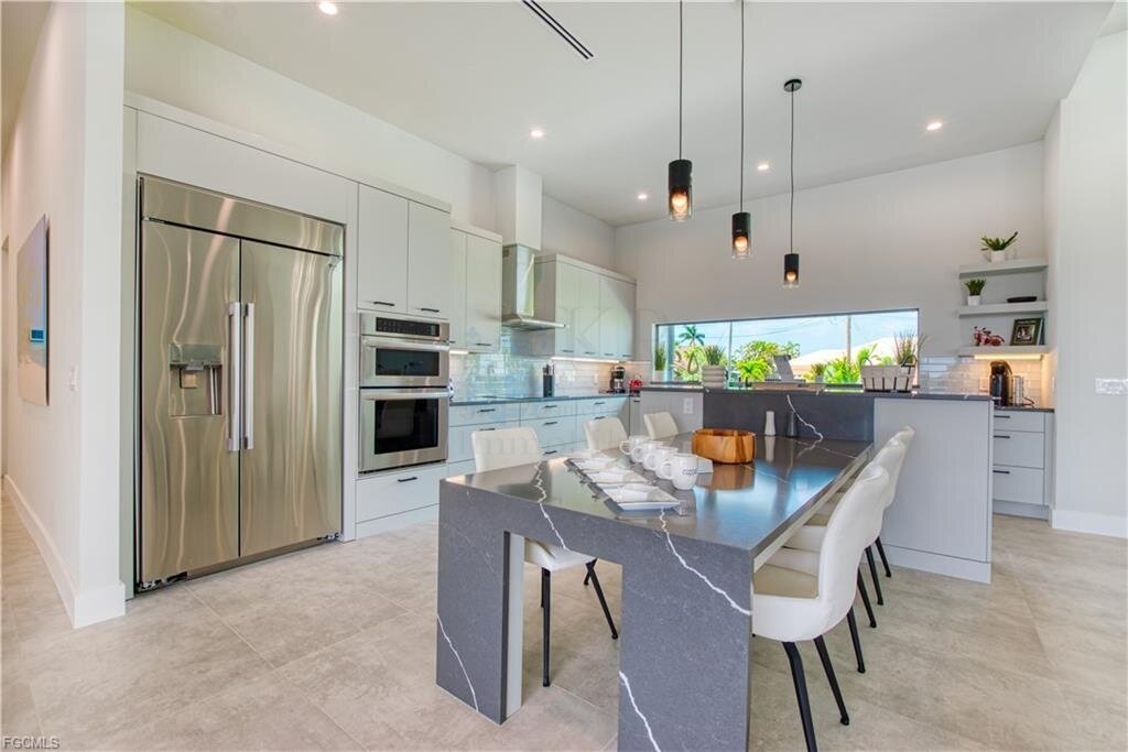 Traumhafte Waterfront-Villa in Cape Coral - Neubau mit Bootsanlage, Salzwasserpool & Luxusausstattung